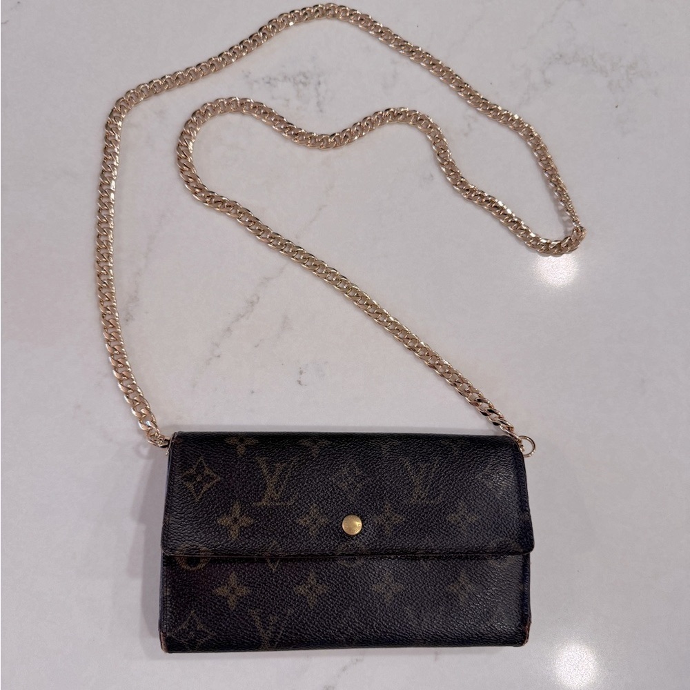 Louis Vuitton Black Crossbody Bag with Gold Hardware and Chain Strap